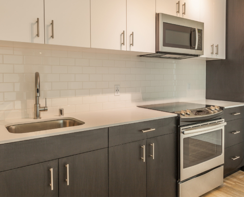 Side view of modern apartment kitchen